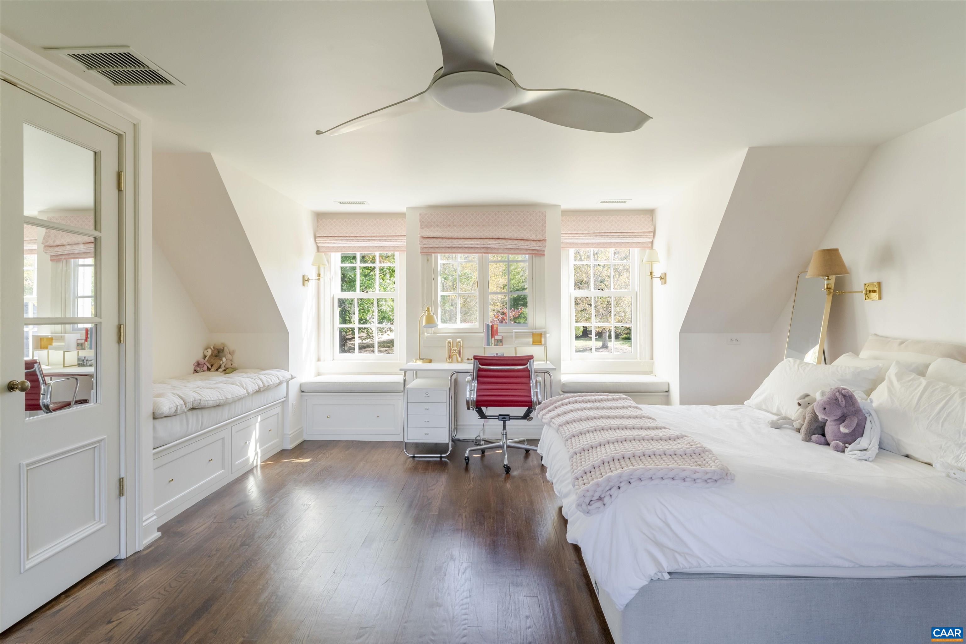 651 Ivy Depot Road Charlottesville, VA 22903 - Photo 37 of 72 a bedroom with a bed and a large window