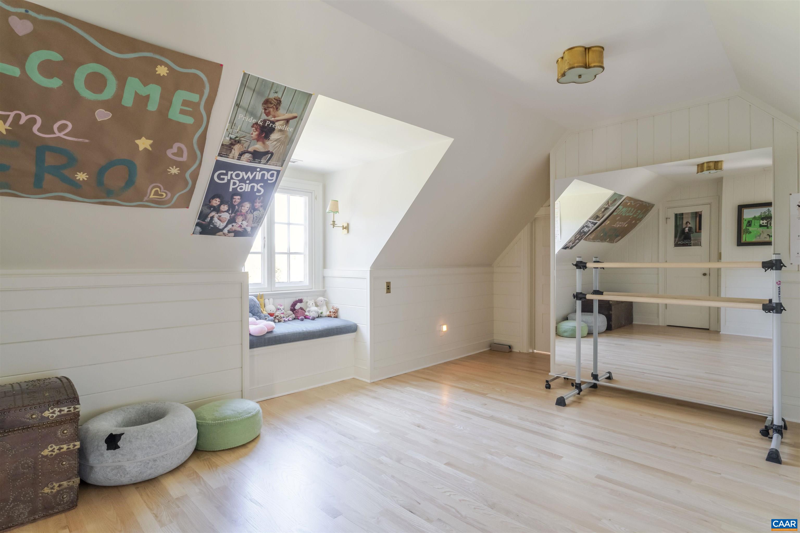 651 Ivy Depot Road Charlottesville, VA 22903 - Photo 46 of 72 a view of a livingroom with wooden floor and a staircase