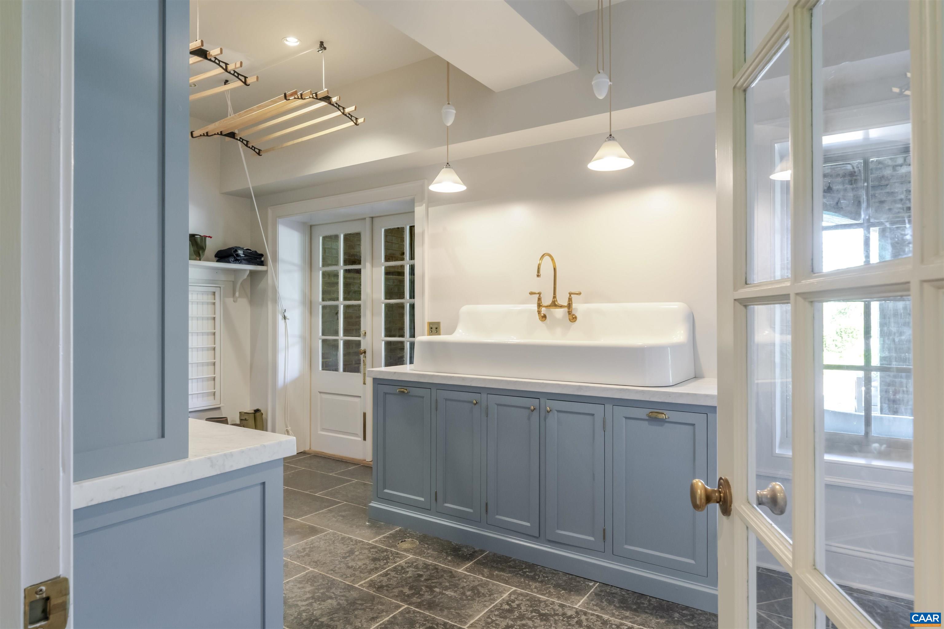 651 Ivy Depot Road Charlottesville, VA 22903 - Photo 50 of 72 a bathroom with a double vanity sink a mirror and a shower