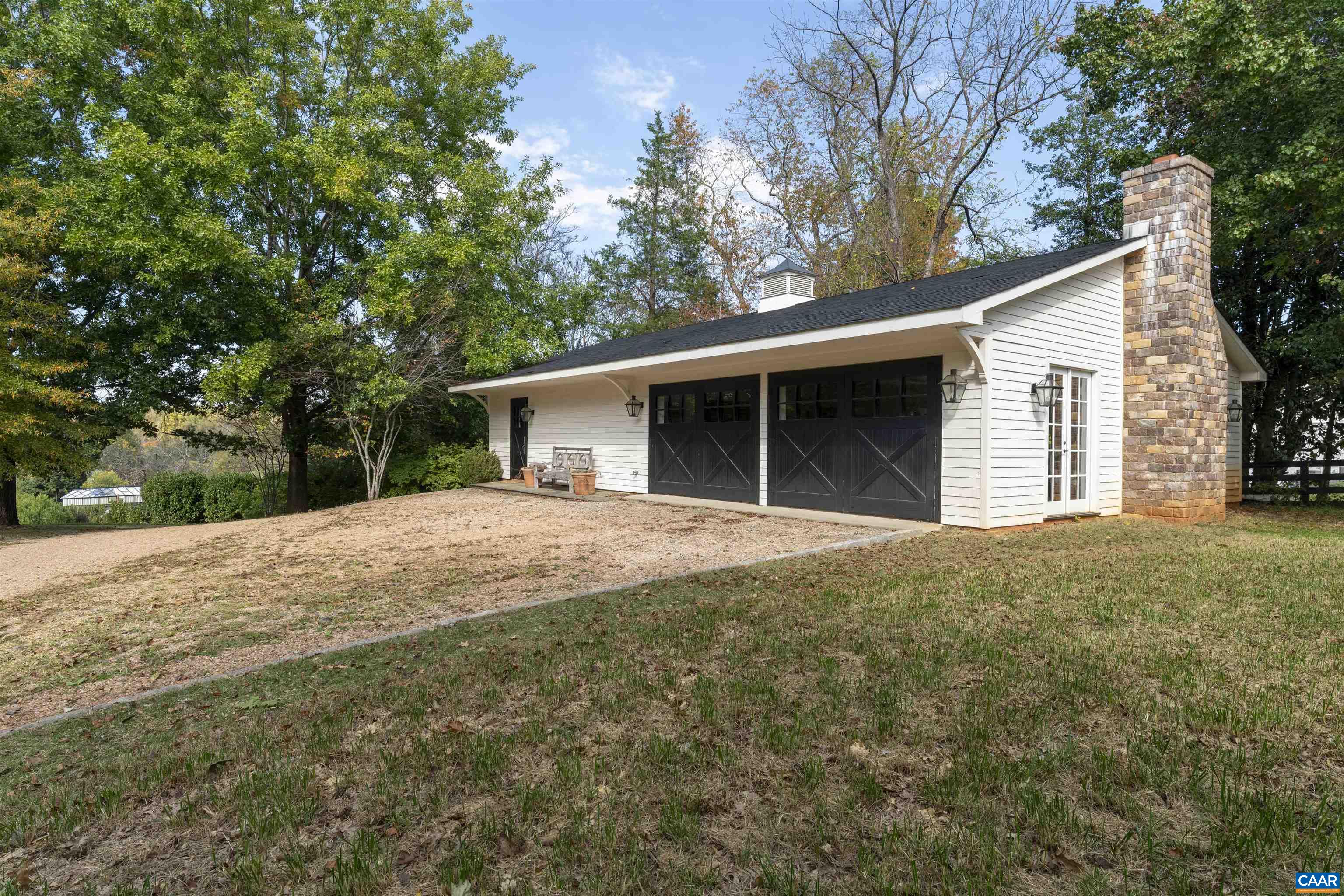 651 Ivy Depot Road Charlottesville, VA 22903 - Photo 52 of 72 a front view of house with yard and trees