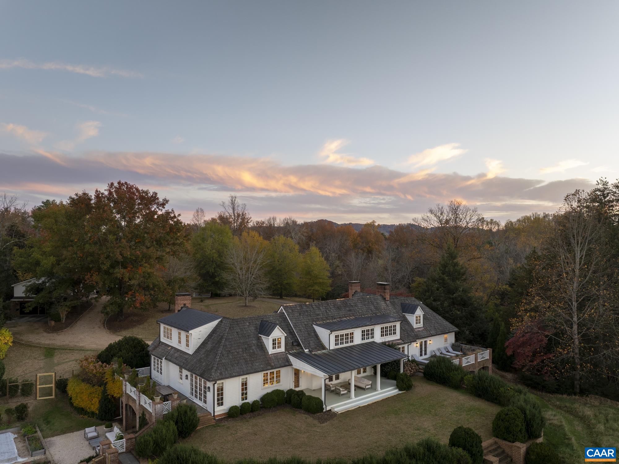 651 Ivy Depot Road Charlottesville, VA 22903 - Photo 65 of 72 an aerial view of residential houses with a yard and mountain view in back