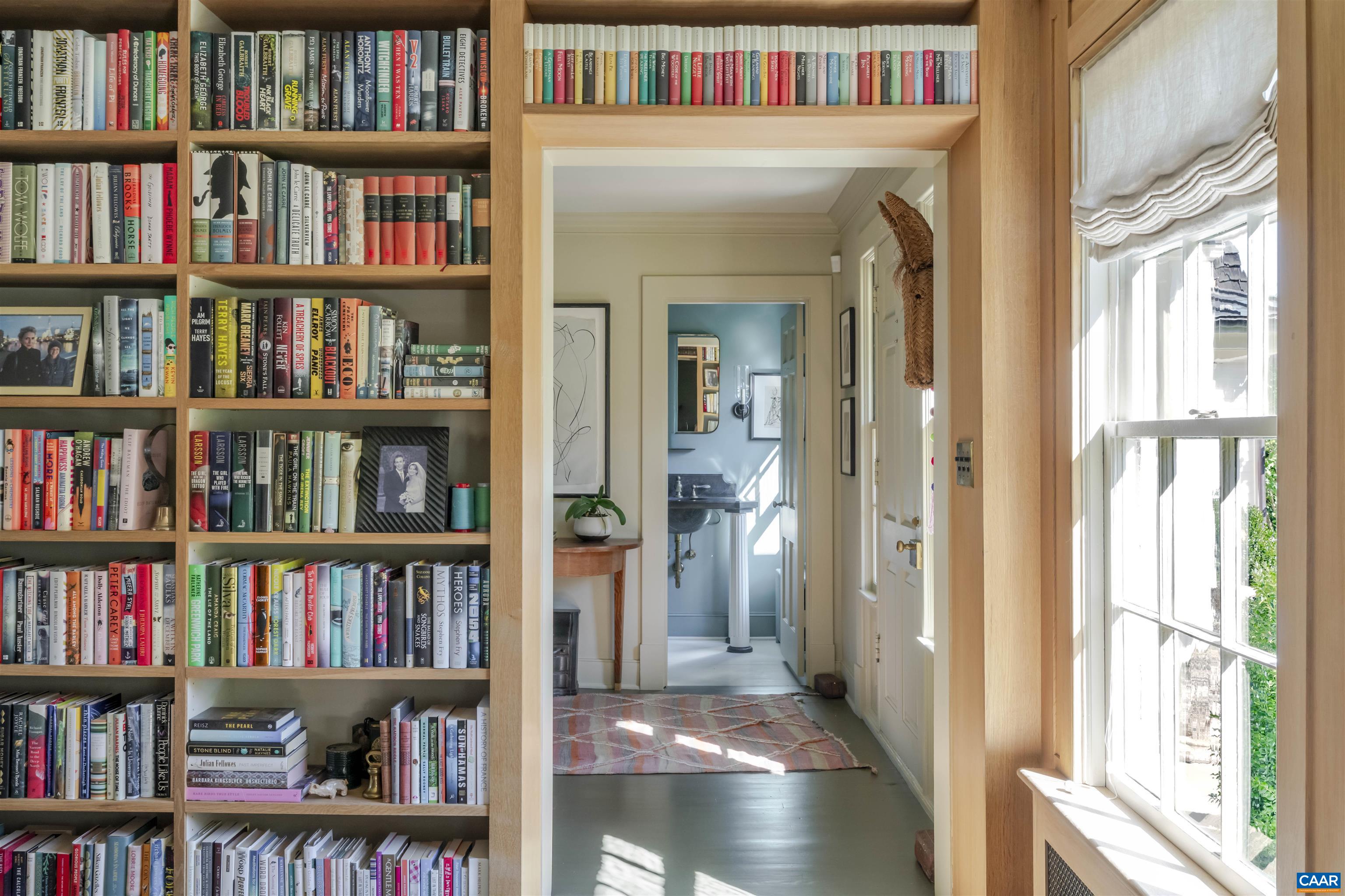 651 Ivy Depot Road Charlottesville, VA 22903 - Photo 10 of 72 a view of a book shelf with a book shelf of a room