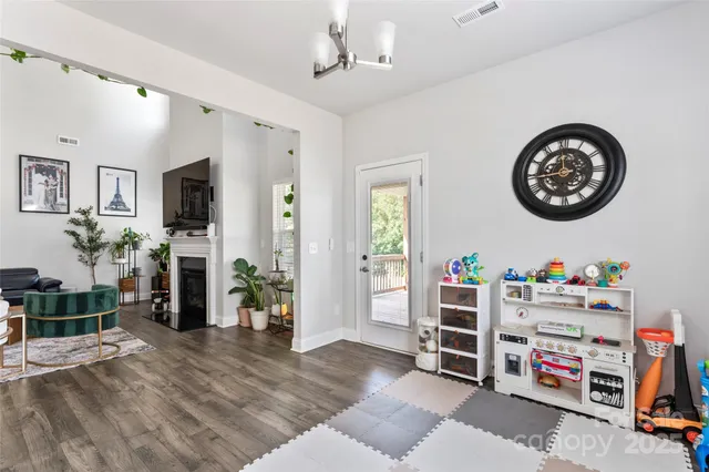 a view of a livingroom with shelves