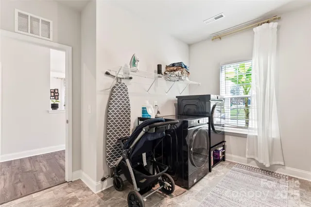 a view of workspace with furniture and window