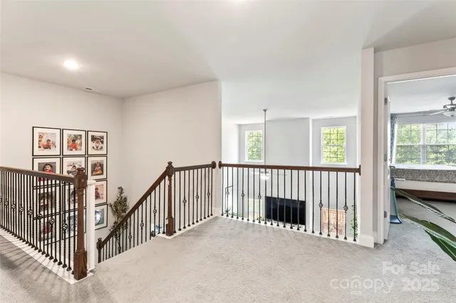 a view of a hallway with windows