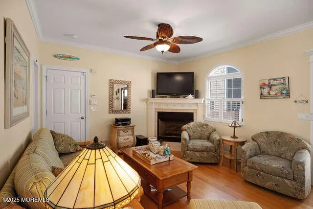 a living room with furniture fireplace and a flat screen tv