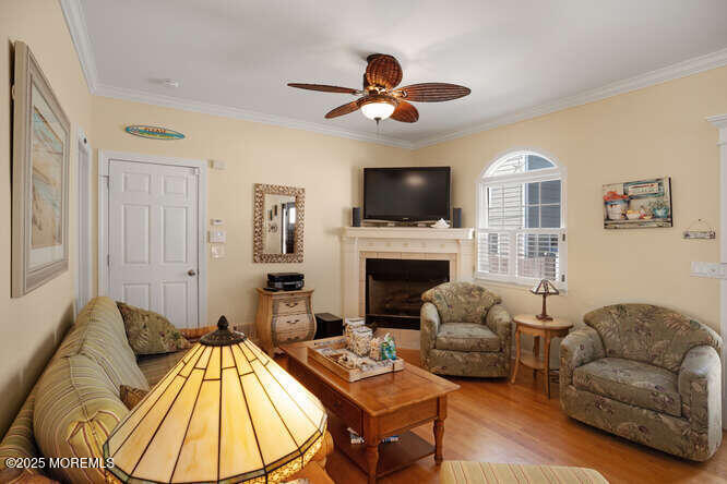 55 Barnegat Way Lavallette, NJ 08735 - Photo 4 of 26 a living room with furniture fireplace and a flat screen tv