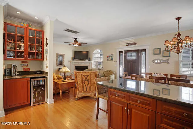 a view of a kitchen and dining room