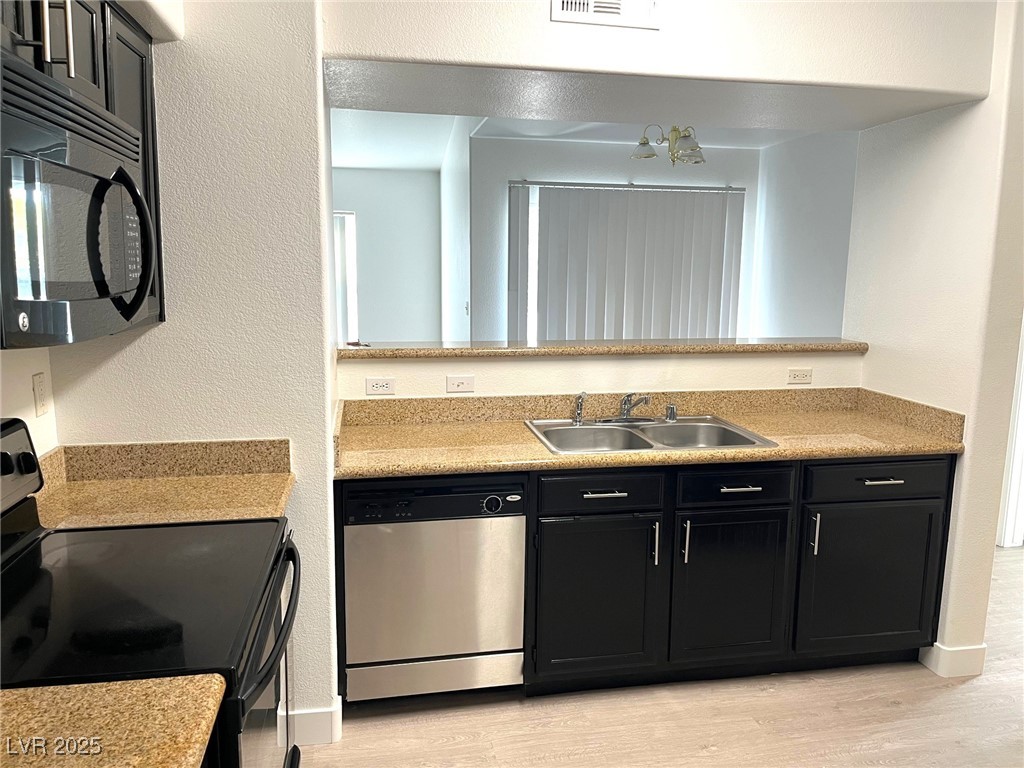 7255 West Sunset Road, Unit 2141 Las Vegas, NV 89113 - Photo 3 of 15 Highly upgraded kitchen with granite and stainless steel