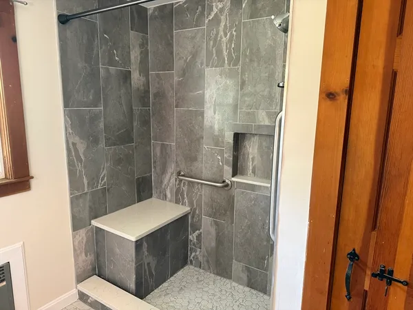 a bathroom with a sink and toilet