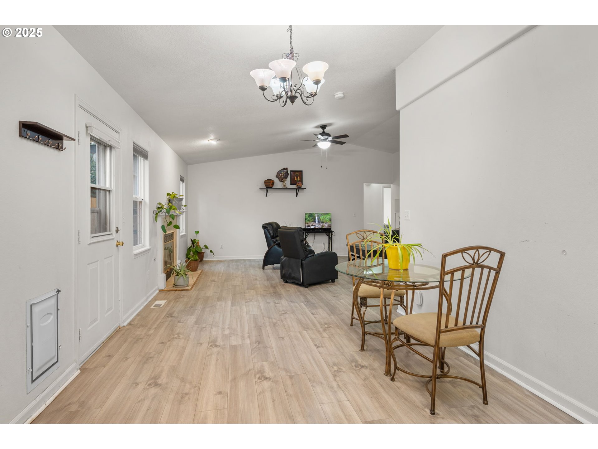 618 Northeast Faloma Road Portland, OR 97211 - Photo 12 of 24 a dining room with furniture and chandelier