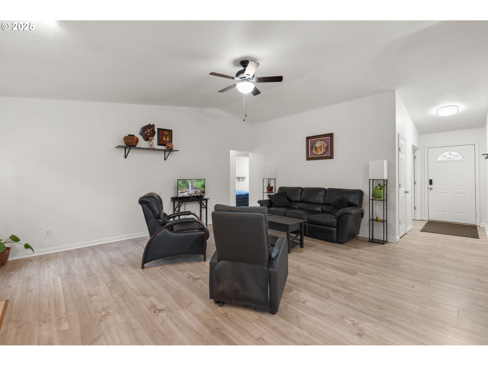 618 Northeast Faloma Road Portland, OR 97211 - Photo 4 of 24 a living room with furniture and a wooden floor