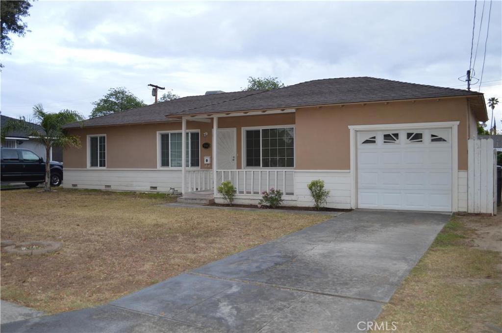 5940 Meadowbrook Lane Riverside, CA 92504 - Photo 1 of 1 front view of house with a yard