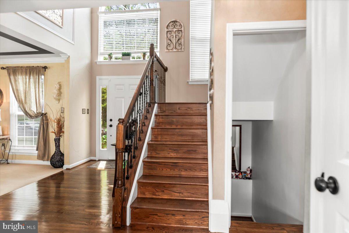 16308 Eddinger Road Bowie, MD 20716 - Photo 14 of 45 a view of entryway and hall with wooden floor