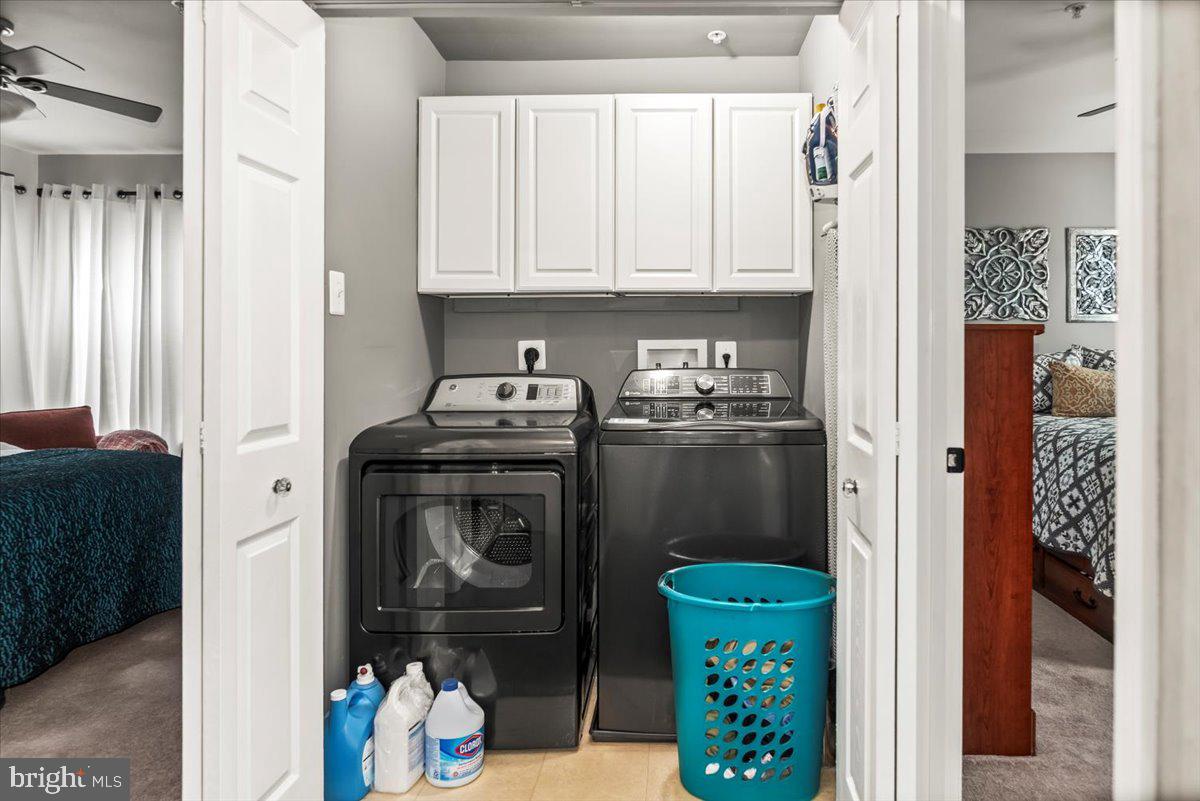 16308 Eddinger Road Bowie, MD 20716 - Photo 20 of 45 a kitchen with stainless steel appliances granite countertop a refrigerator and a sink