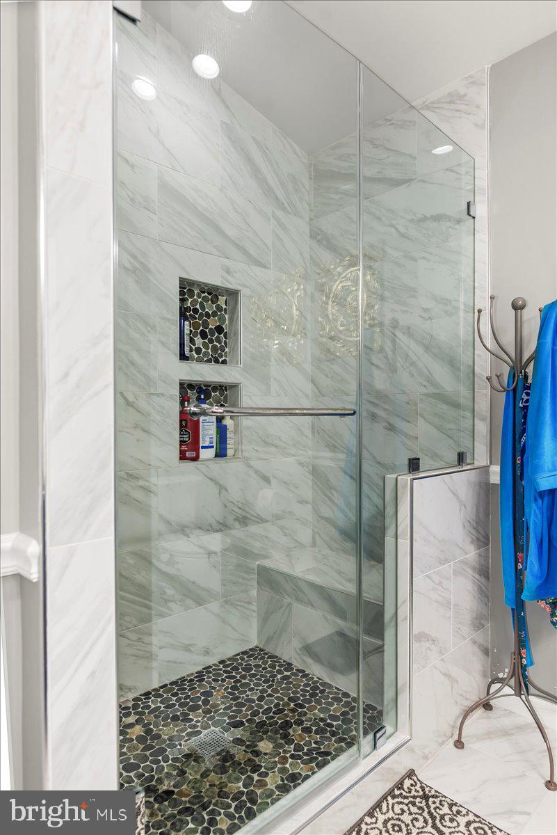 16308 Eddinger Road Bowie, MD 20716 - Photo 32 of 45 a bathroom with a shower