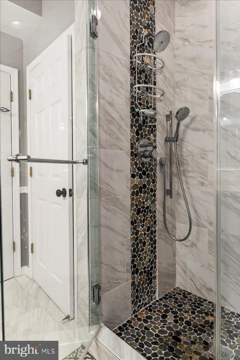 16308 Eddinger Road Bowie, MD 20716 - Photo 33 of 45 a bathroom with a shower