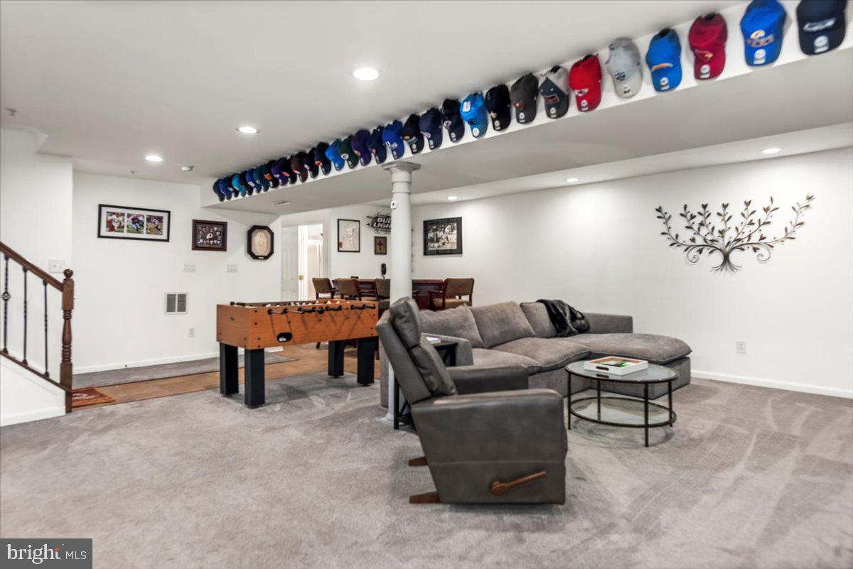 16308 Eddinger Road Bowie, MD 20716 - Photo 34 of 45 a living room with furniture