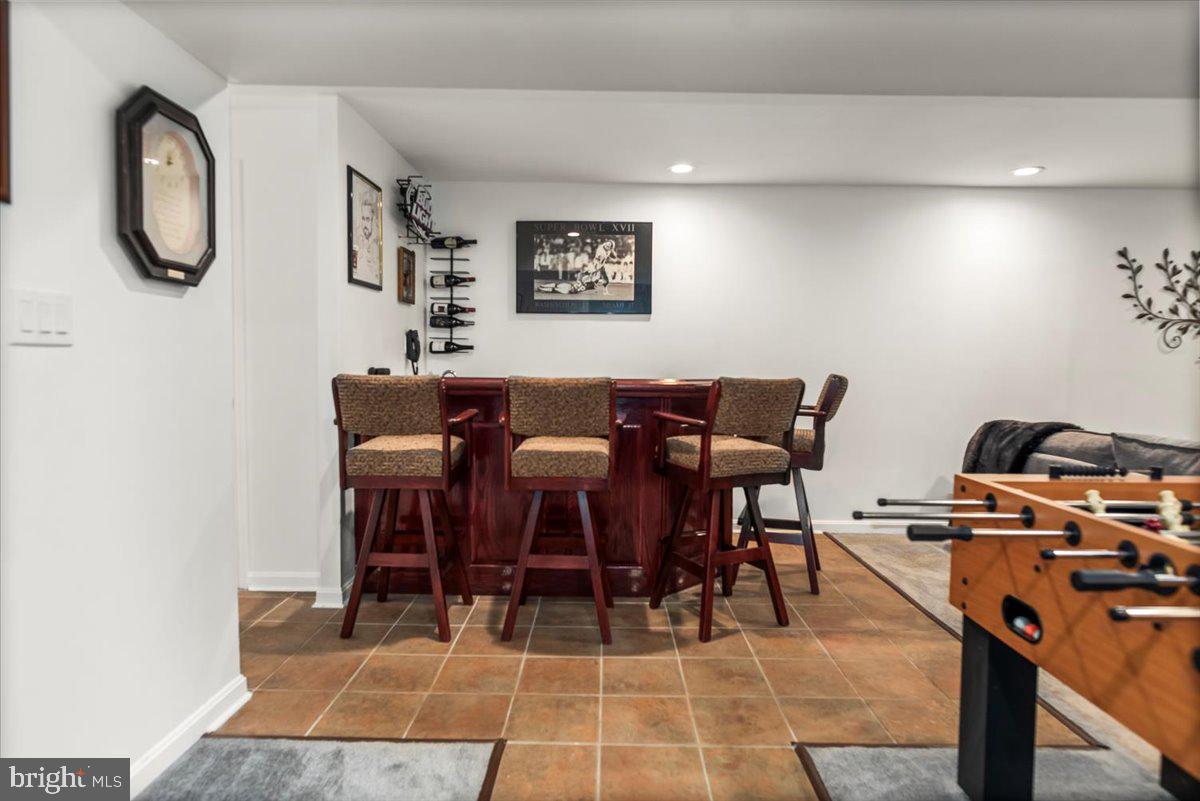 16308 Eddinger Road Bowie, MD 20716 - Photo 36 of 45 a view of a dining room with furniture