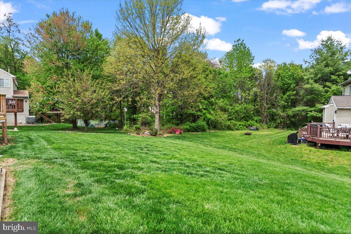16308 Eddinger Road Bowie, MD 20716 - Photo 45 of 45 a view of a house with a backyard