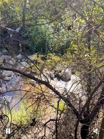a view of beach with ocean