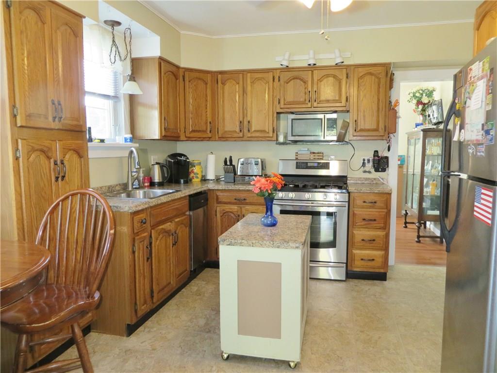 1107 Maple St Extension Coraopolis, PA 15108 - Photo 2 of 13 Newer Oak Kitchen w/Vangura Anti-microbial Counter tops & Stainless Appliances.