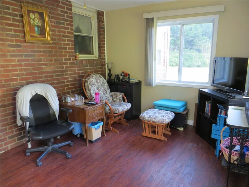 1107 Maple St Extension Coraopolis, PA 15108 - Photo 11 of 13 Florida Room w/access to back patio.