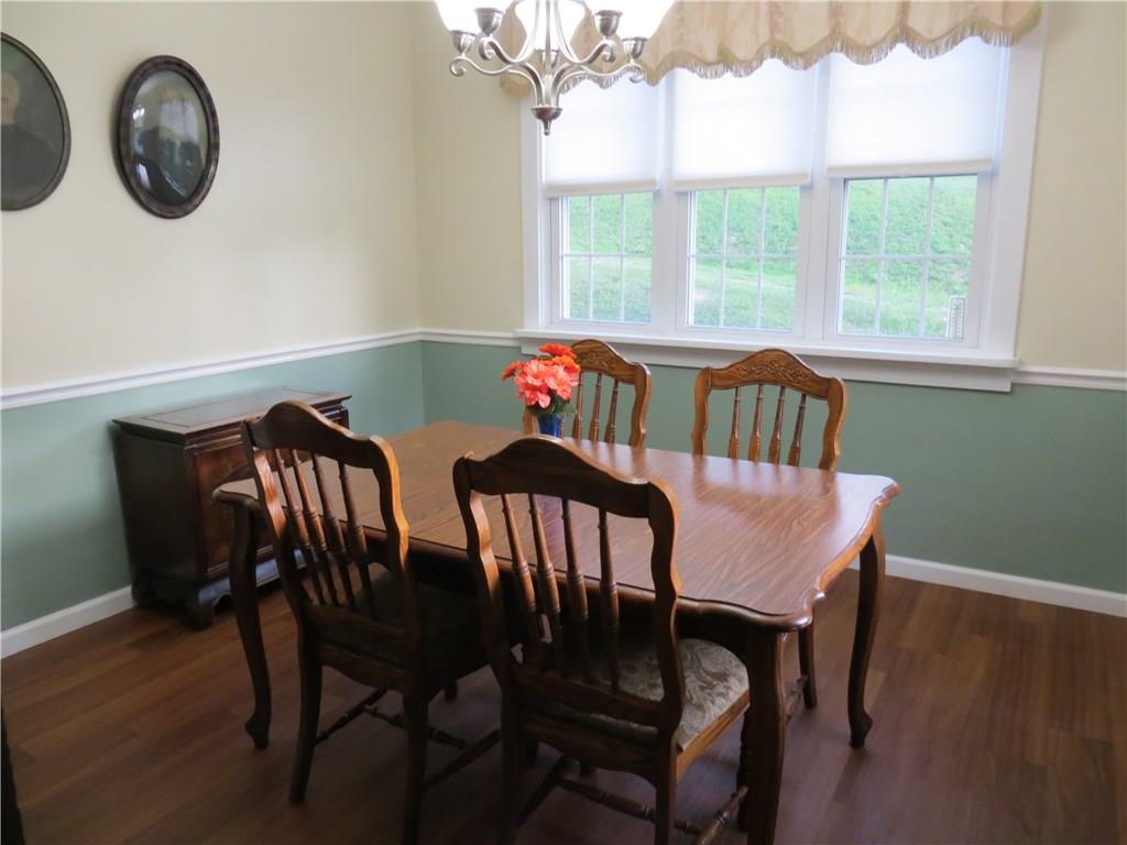 1107 Maple St Extension Coraopolis, PA 15108 - Photo 6 of 13 Light & Bright Dining Room w/Chair Rail.