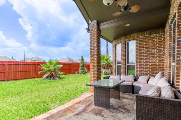 a outdoor living space with furniture and garden