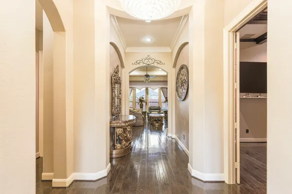 a view of living room with wooden floor