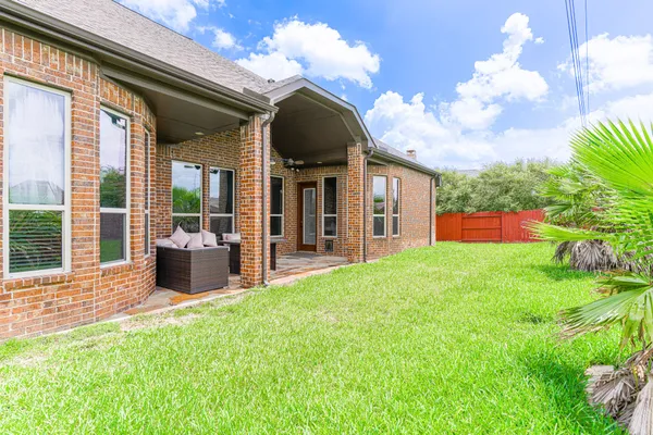 a house view with a garden space