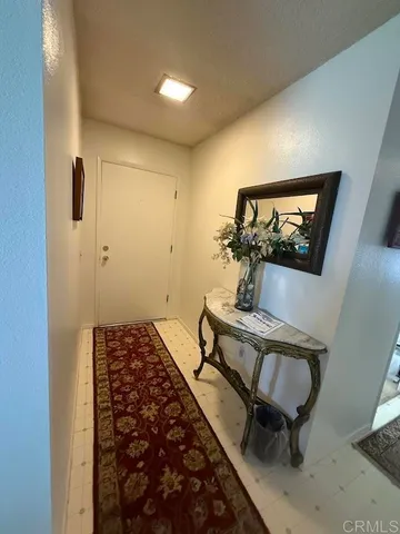 a bedroom with bed and a dresser