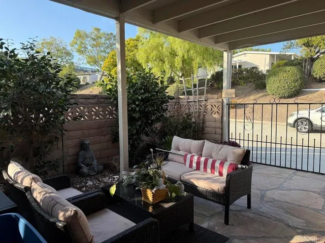 a view of a porch with furniture
