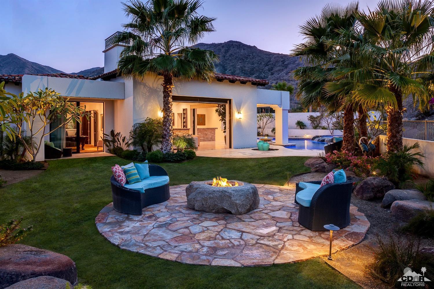 18 Rockcrest Drive Rancho Mirage, CA 92270 - Photo 2 of 35 a front view of a house with patio