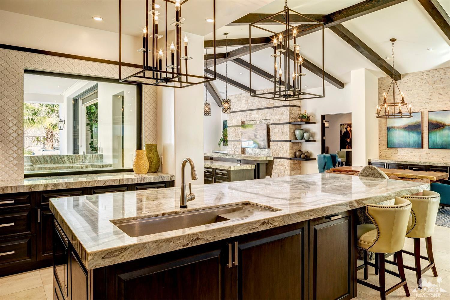 18 Rockcrest Drive Rancho Mirage, CA 92270 - Photo 13 of 35 a kitchen with a sink a counter space and wooden floor