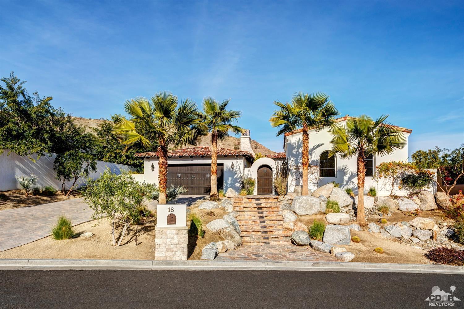 18 Rockcrest Drive Rancho Mirage, CA 92270 - Photo 4 of 35 a view of a house with a snow on the road