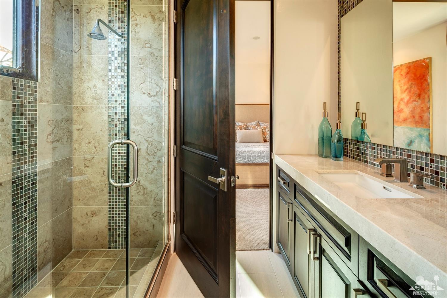 18 Rockcrest Drive Rancho Mirage, CA 92270 - Photo 31 of 35 a bathroom with a shower and a sink
