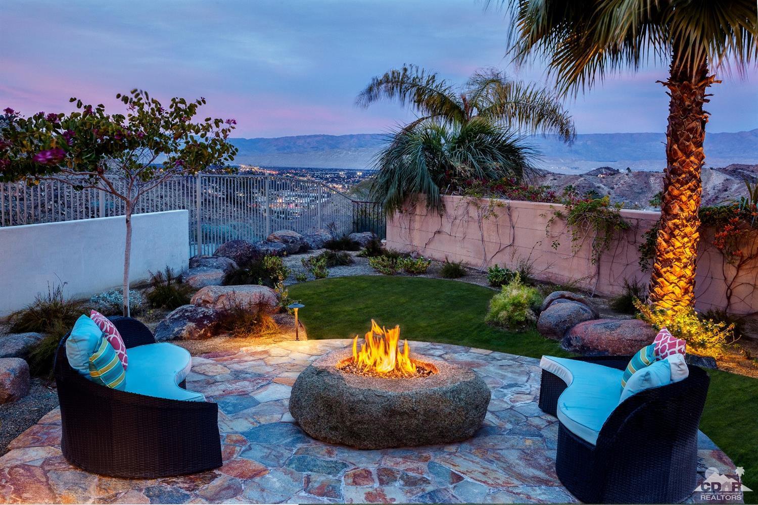 18 Rockcrest Drive Rancho Mirage, CA 92270 - Photo 35 of 35 a view of a backyard with plants and a fountain