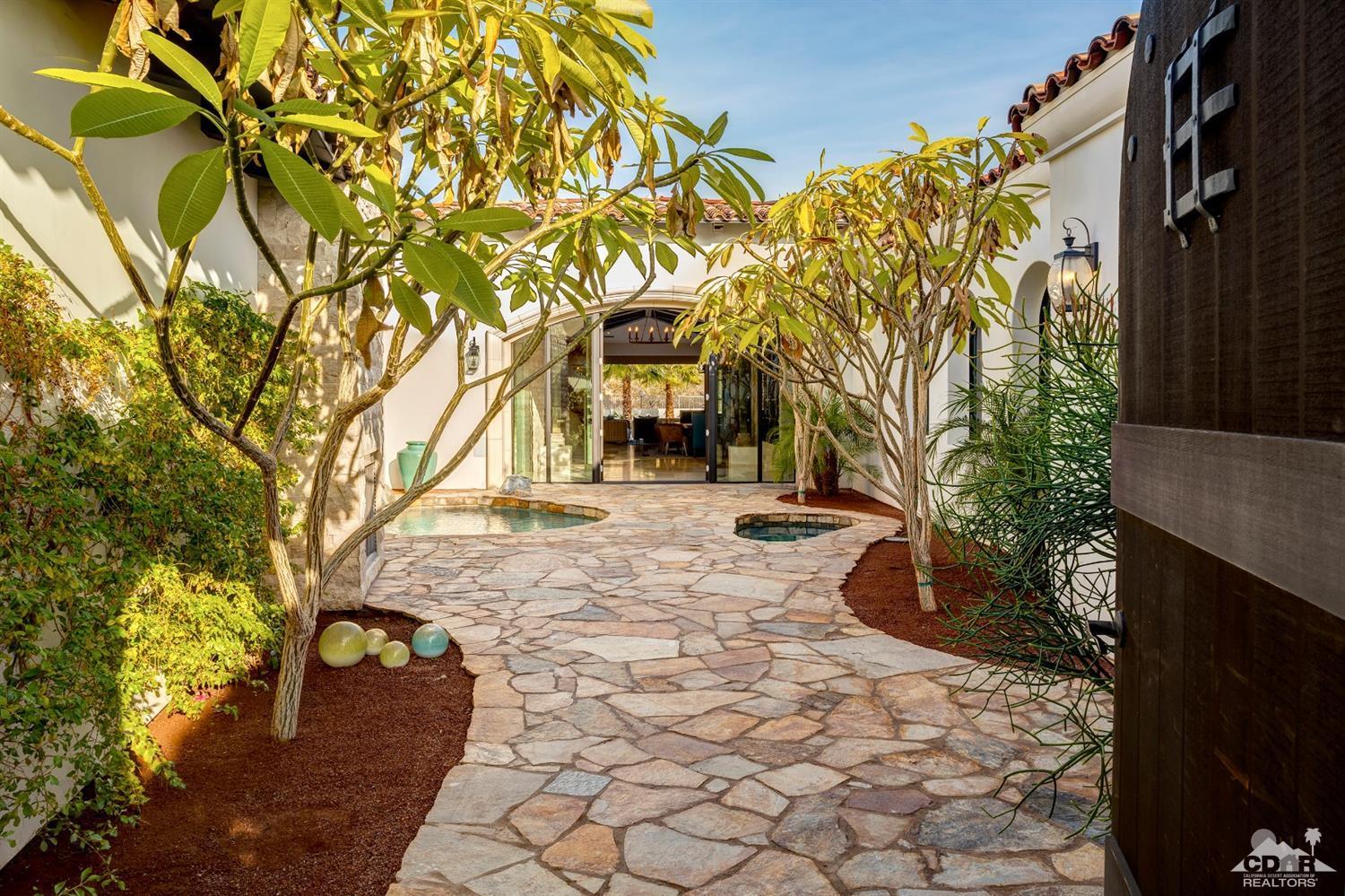 18 Rockcrest Drive Rancho Mirage, CA 92270 - Photo 6 of 35 a view of entrance gate of a house