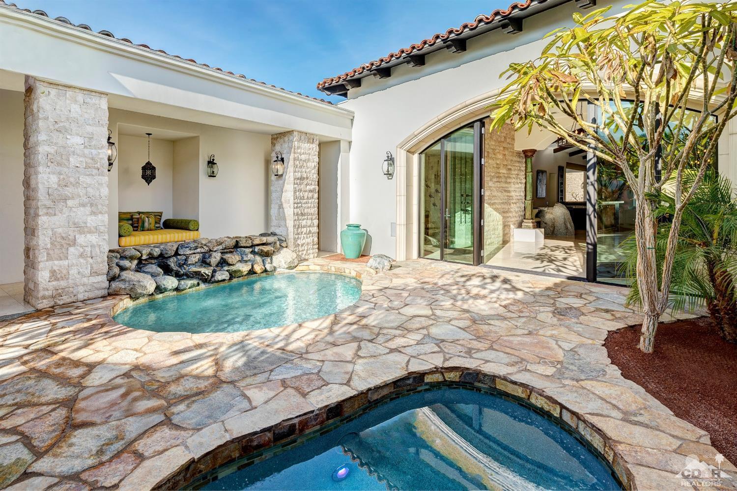 18 Rockcrest Drive Rancho Mirage, CA 92270 - Photo 8 of 35 a view of swimming pool with an outdoor seating