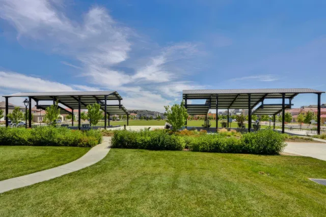a backyard of a house with lots of green space