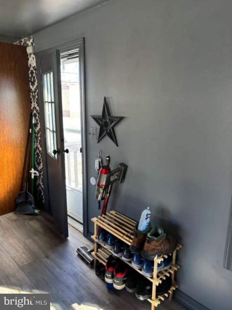 1762 Crown Point Road, Unit 33WS Thorofare, NJ 08086 - Photo 13 of 29 a room with gym equipment and wooden floor