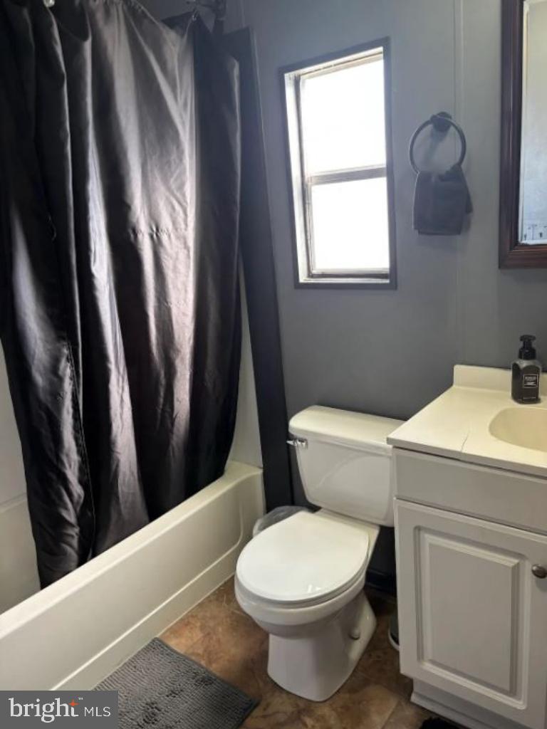 1762 Crown Point Road, Unit 33WS Thorofare, NJ 08086 - Photo 19 of 29 a white toilet sitting next to a bathroom sink
