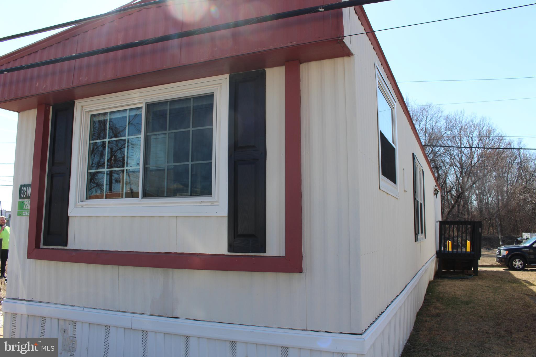 1762 Crown Point Road, Unit 33WS Thorofare, NJ 08086 - Photo 2 of 29 a view of a house with a large window and car parked