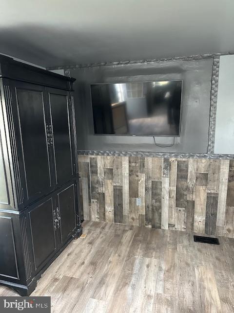 1762 Crown Point Road, Unit 33WS Thorofare, NJ 08086 - Photo 24 of 29 a view of a refrigerator in kitchen and wooden floor