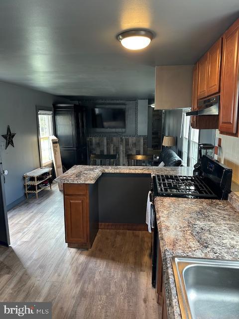 1762 Crown Point Road, Unit 33WS Thorofare, NJ 08086 - Photo 28 of 29 a kitchen with sink a refrigerator and chairs