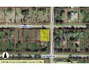 26403 Glaspell Road Punta Gorda, FL 33955 - Photo 1 of 1 a view of a park with large trees