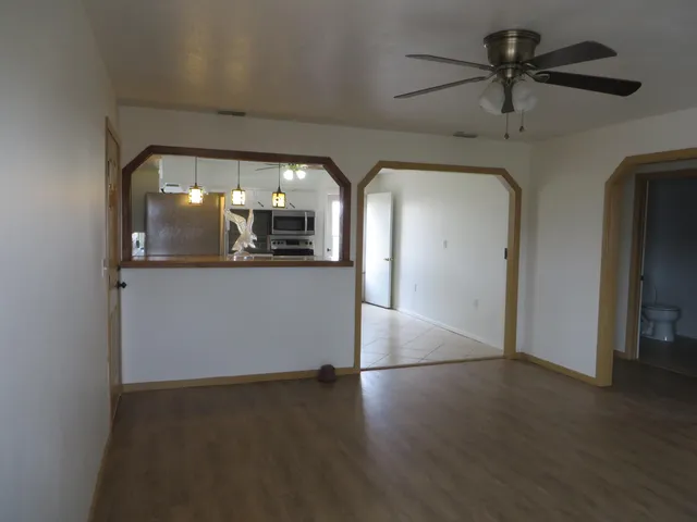 a view of a livingroom with wooden floor