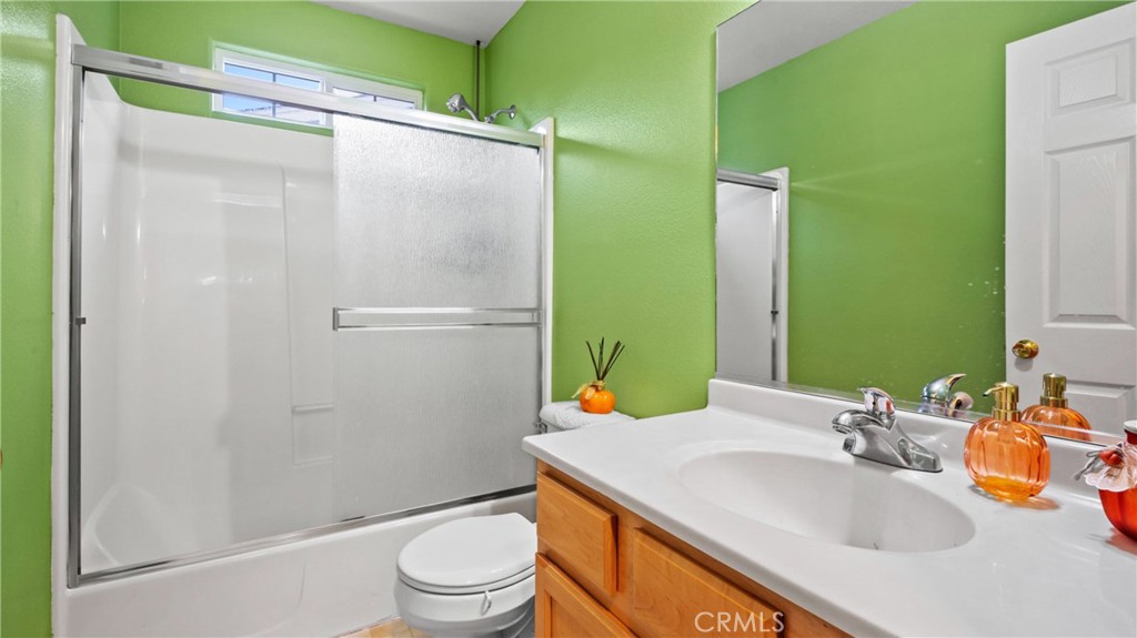 19070 Ravenhill Road Hidden Valley Lake, CA 95467 - Photo 15 of 27 a bathroom with a sink and a mirror