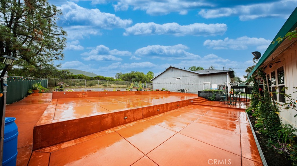 19070 Ravenhill Road Hidden Valley Lake, CA 95467 - Photo 21 of 27 a view of swimming pool with a lounge chairs